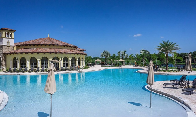 Gran Paradiso Villa | Sunset Lake View Villa with Resort Amenities Near Golf, Beach & Restaurants!