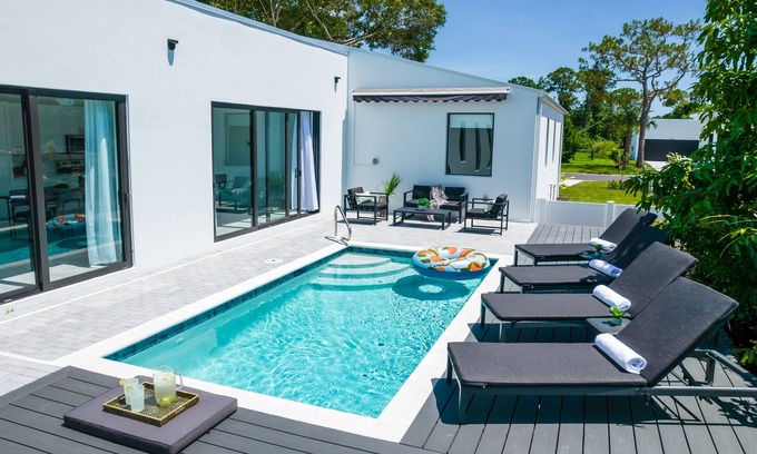 East Naples House | THE OASIS, Brand New Home, Screened in Heated Pool, Close to 5th Ave and Beach