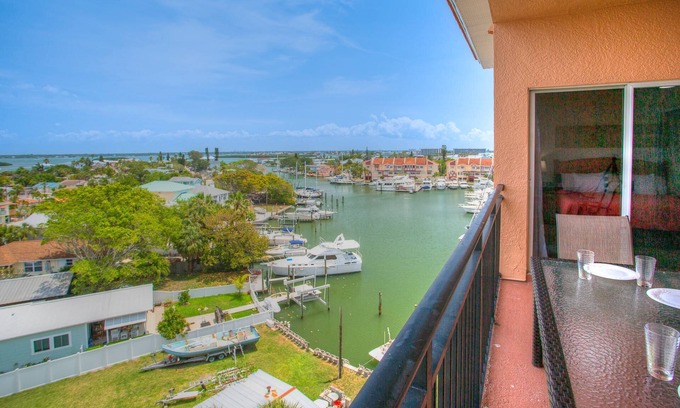 Madeira Beach Condo | Top Floor Overlooking the Marina. Close to Johns Pass. Spacious with Two Private Balconies!