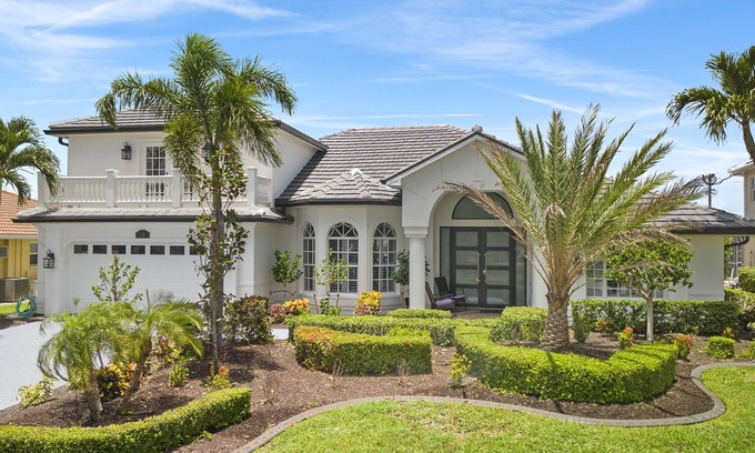 Pelican House | Unbeatable Direct Gulf Access Heated Pool Home with a Hot Tub and 6 bedrooms!