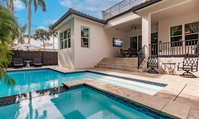 Naples Park House | Walk to Beach! Luxe Modern Beach Home w/Heated Pool & Spa