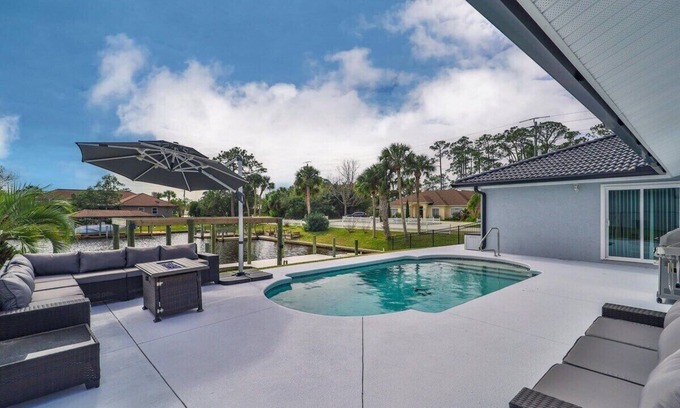 Palm Harbor House | Waterfront Paradise w/Heated Pool & Private Dock