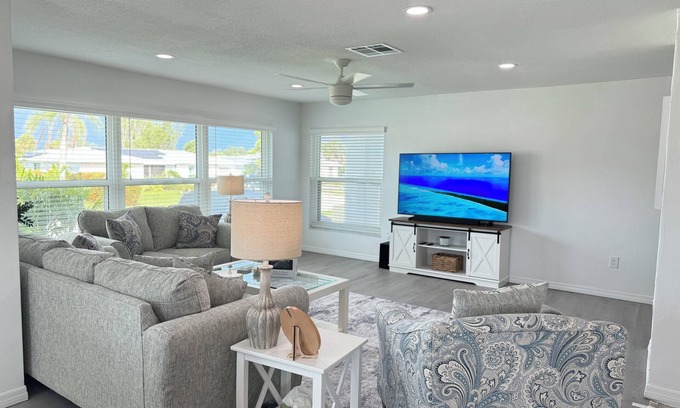 Oakland Hills House | Waterfront Retreat 4 BR, 3 BA screened & heated pool, gorgeous canal views