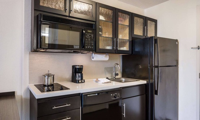 Baymeadows House | Your Home in Jacksonville! Pet-friendly Suite with Full Kitchen! Parking Onsite!