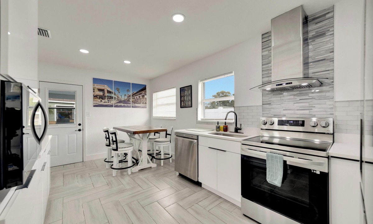 Ybor City House | Relaxing AF Tampa Home with Hot Tub, Outside Fun, and TVs in every room!