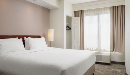 Suite, 1 King Bed with Sofa bed, Hearing Accessible (Roll-in Shower)