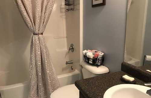 Fayetteville House | Discover serenity at our retreat, situated on 1.5 acres.